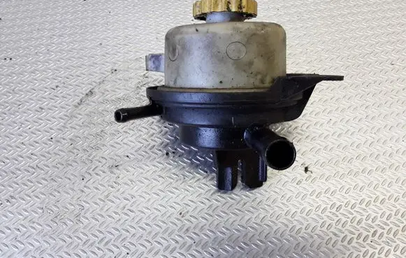 Chrysler Voyager Power steering fluid tank/reservoir 04743012AA