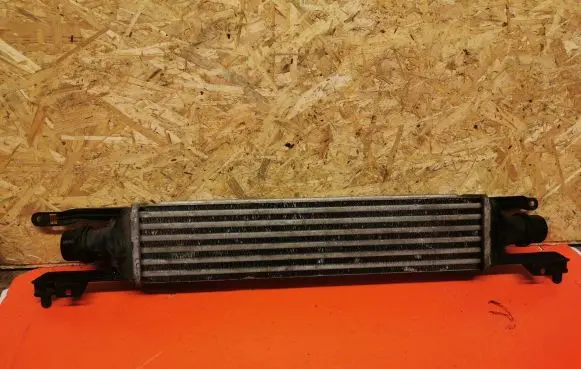 Opel Corsa D Intercooler radiator 55702194