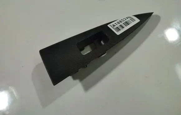 Nissan Note (E11) Front door window switch trim 