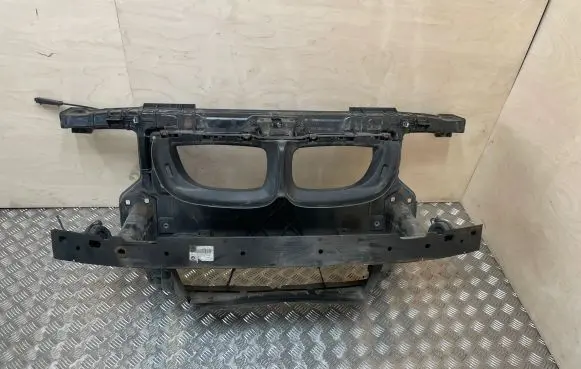 Radiator support slam panel