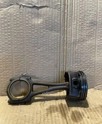 Opel Corsa D Piston with connecting rod 