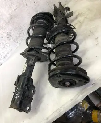 Ford Focus Front shock absorber with coil spring Jx6118045eeg