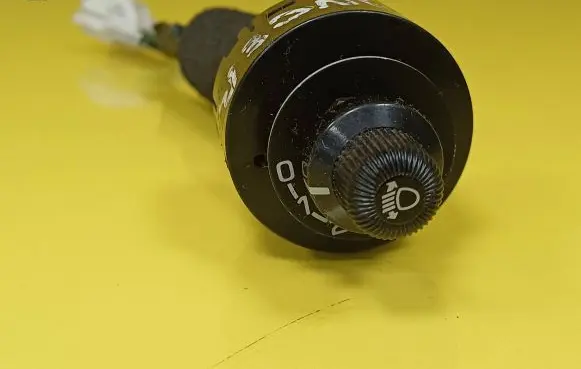 Mitsubishi Lancer Headlight level height control switch