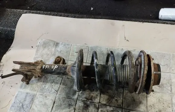 Front shock absorber with coil spring