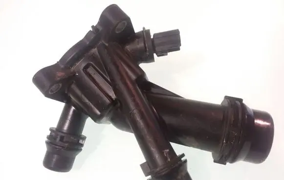 Thermostat/thermostat housing