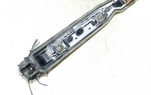 Opel Corsa C Tail light bulb cover holder