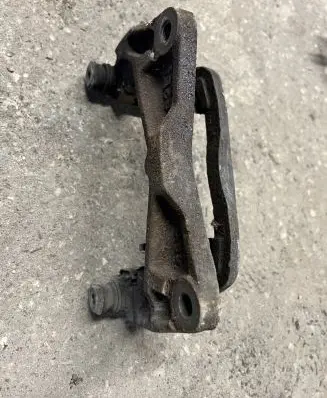Subaru Outback Front Brake Caliper Pad/Carrier 