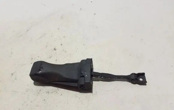 Front door check strap stopper