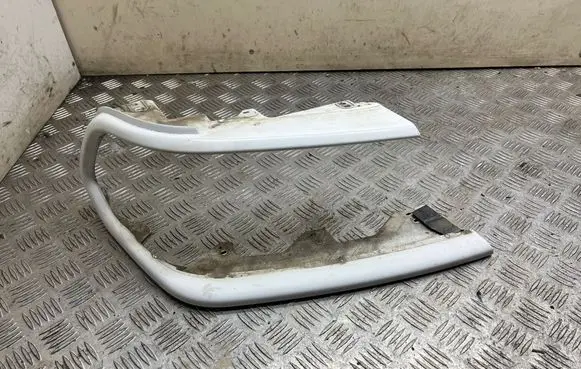 Mitsubishi Pajero Sport I Under headlight/headlamp trim 10087415