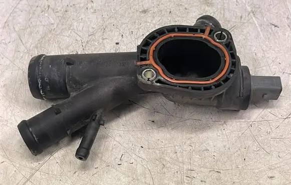 Volkswagen Golf VI Engine coolant pipe/hose 03L121131AA