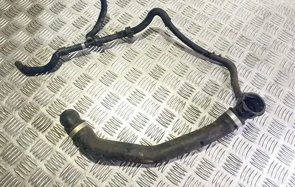 Volkswagen PASSAT B8 Engine coolant pipe/hose 5Q0122101GH