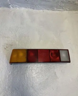 Volkswagen PASSAT Tail light lenses 325945111B