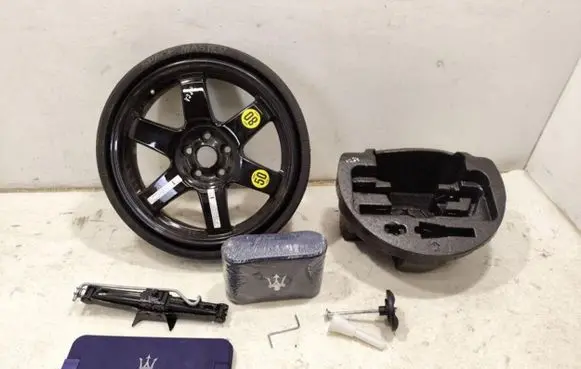 Maserati Quattroporte R18 spare wheel 670010518