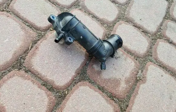 Thermostat/thermostat housing
