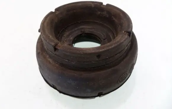 Volkswagen Golf IV Front coil spring rubber mount 1J0412331C