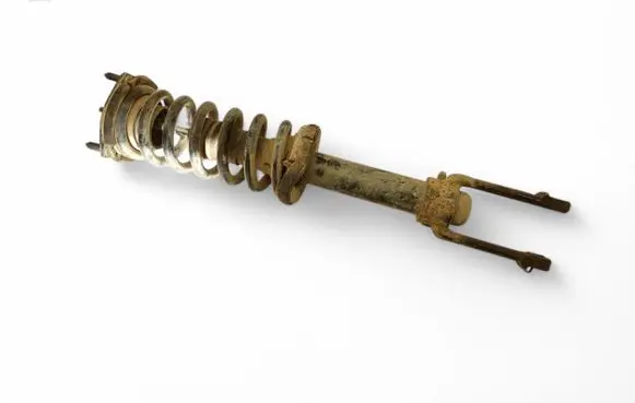 Jeep Commander Front shock absorber with coil spring 52124343AC