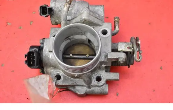 Mazda 323 Throttle body valve ZM015580