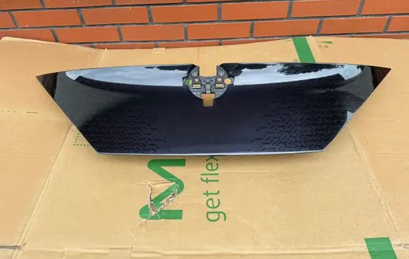Nissan Ariya Front bumper upper radiator grill 623105MP0A