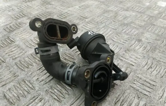 Volkswagen Touareg II Thermostat housing 059121506G 059121737