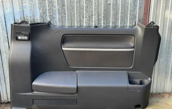 Volkswagen Multivan T5 Trunk/boot side trim panel 7H5868715