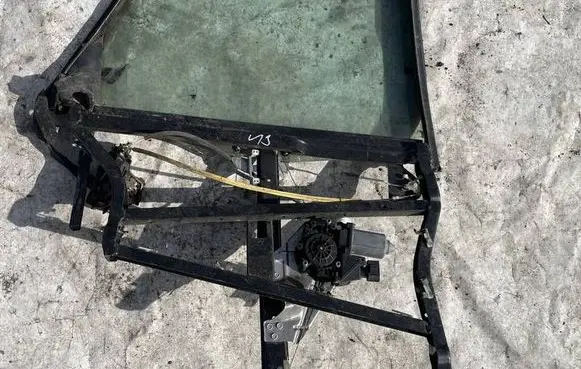 Sliding door window regulator with motor