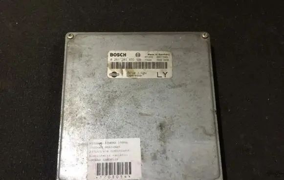 Nissan Primera Engine control unit/module 0261203855 237103j404