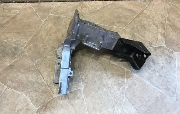 Radiator support slam panel bracket