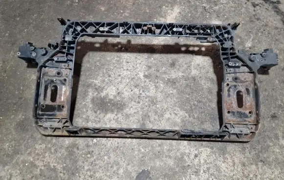 Radiator support slam panel