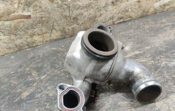 Thermostat/thermostat housing