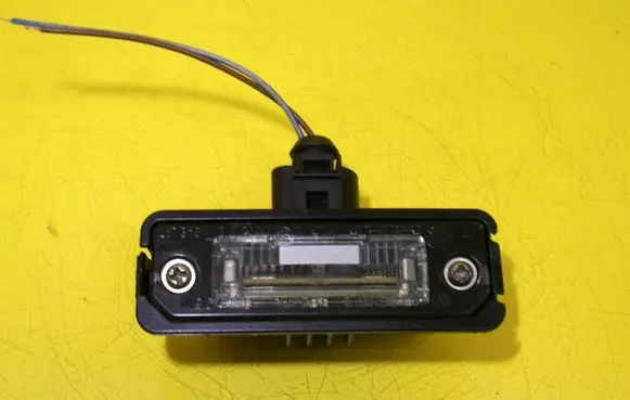 Volkswagen Polo IV 9N3 Number plate light 1J6943021B