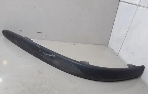 Rear bumper trim bar molding