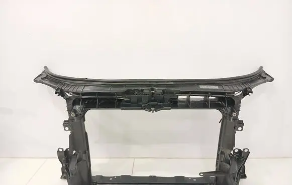 Radiator support slam panel