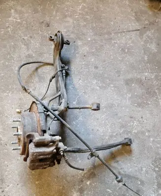 Rear wheel hub spindle/knuckle