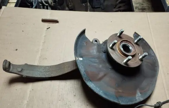 Front wheel hub spindle knuckle