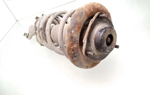Nissan Primera Front shock absorber with coil spring