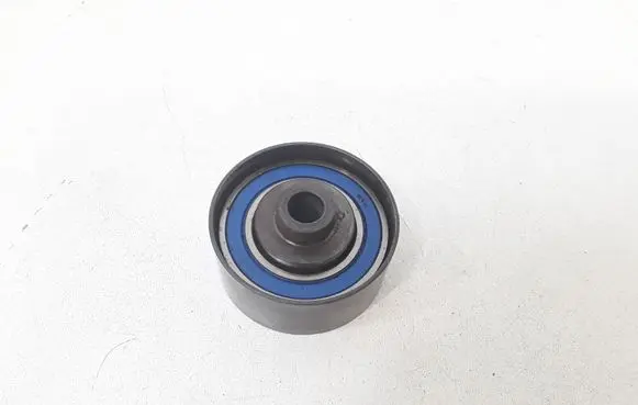 Opel Astra H Timing belt tensioner pulley 
