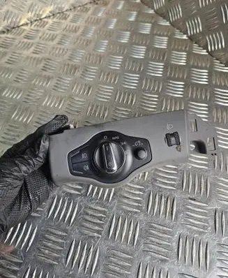 Headlight level height control switch