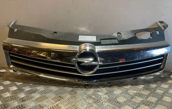 Opel Astra H Front bumper upper radiator grill 13225780