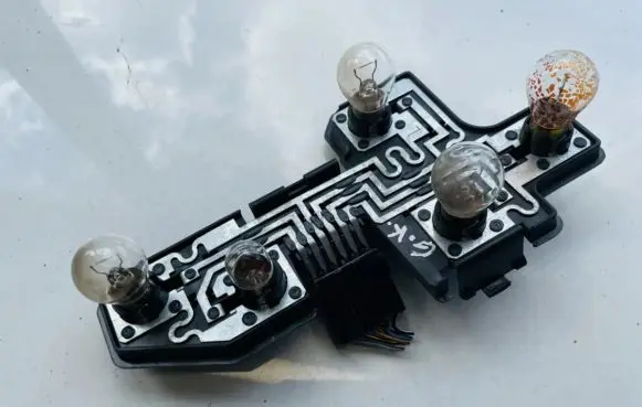 Opel Corsa B Tail light bulb cover holder 5016