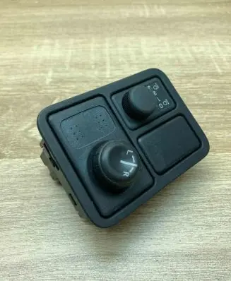 Nissan Almera N16 Wing mirror switch