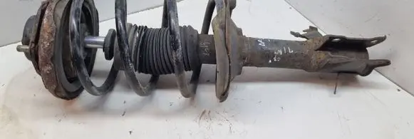 Nissan Almera Tino Front shock absorber/damper 54302BU111