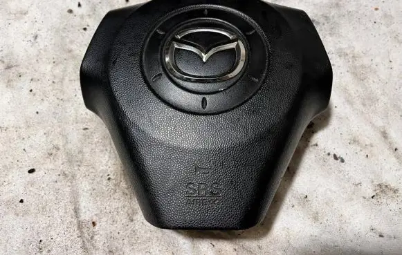 Mazda 3 I Steering wheel airbag