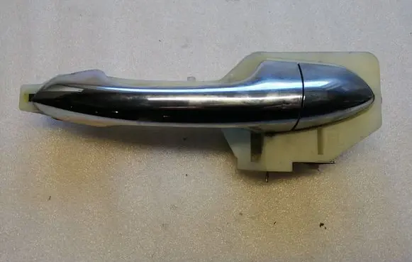 KIA Carens III Front door exterior handle