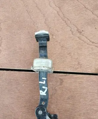 Infiniti EX Front door check strap stopper