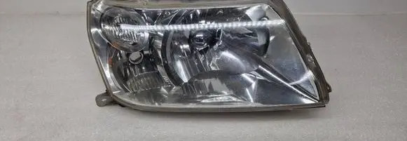 Suzuki Grand Vitara II Headlight/headlamp 10059076