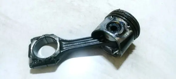 Piston with connecting rod