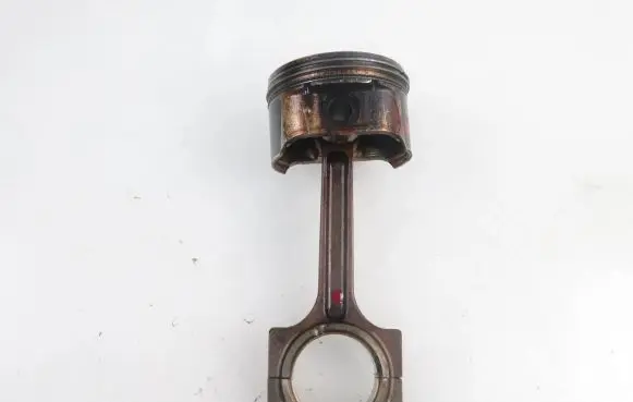 Piston with connecting rod