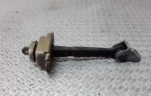 Nissan Primera Front door check strap stopper