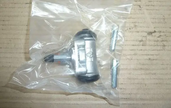 Nissan Vanette Front brake caliper J3231068