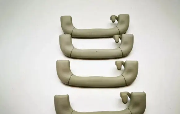Saab 9-5 A set of handles for the ceiling 90459155 2020496